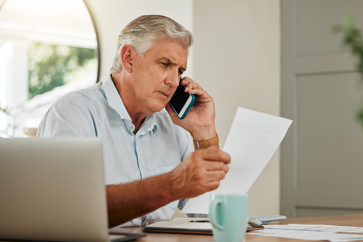 Man reviewing financial documents