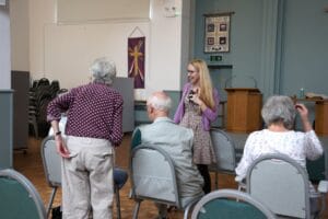 Jo Clearly, our learning and development manager, speaking with attendees at our recent dementia event