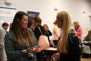 Attendees chatting at our recent dementia information market place event