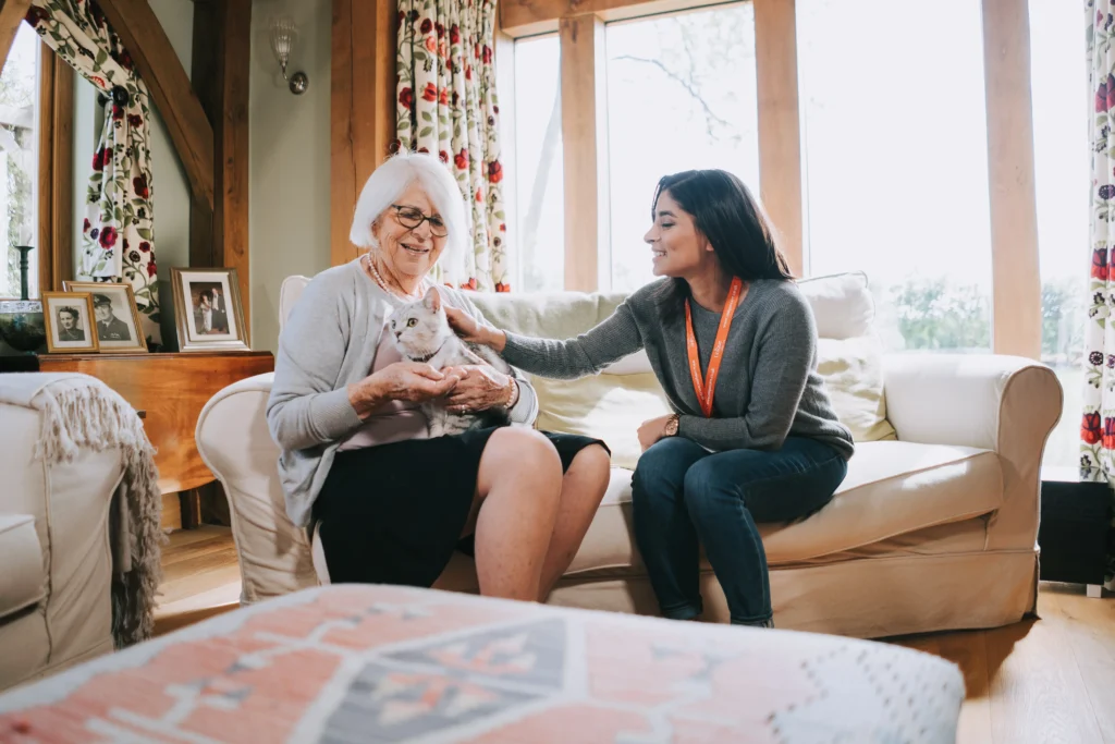 Lady with carer in room that has been prepared for live in carer