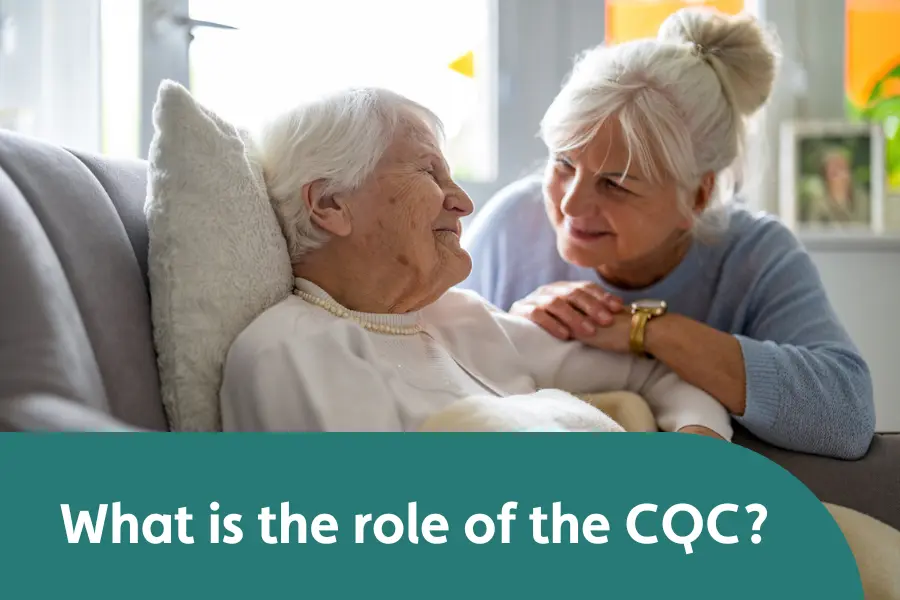 Older woman sitting on a sofa being comforted by a caregiver, with the text 'What is the role of the CQC?' at the bottom.